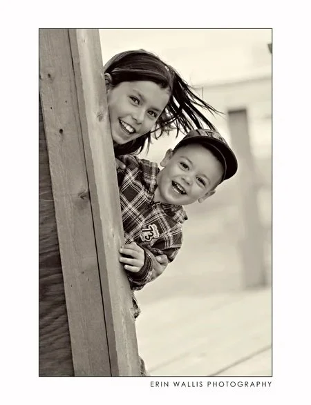 Brother and sister peek a boo