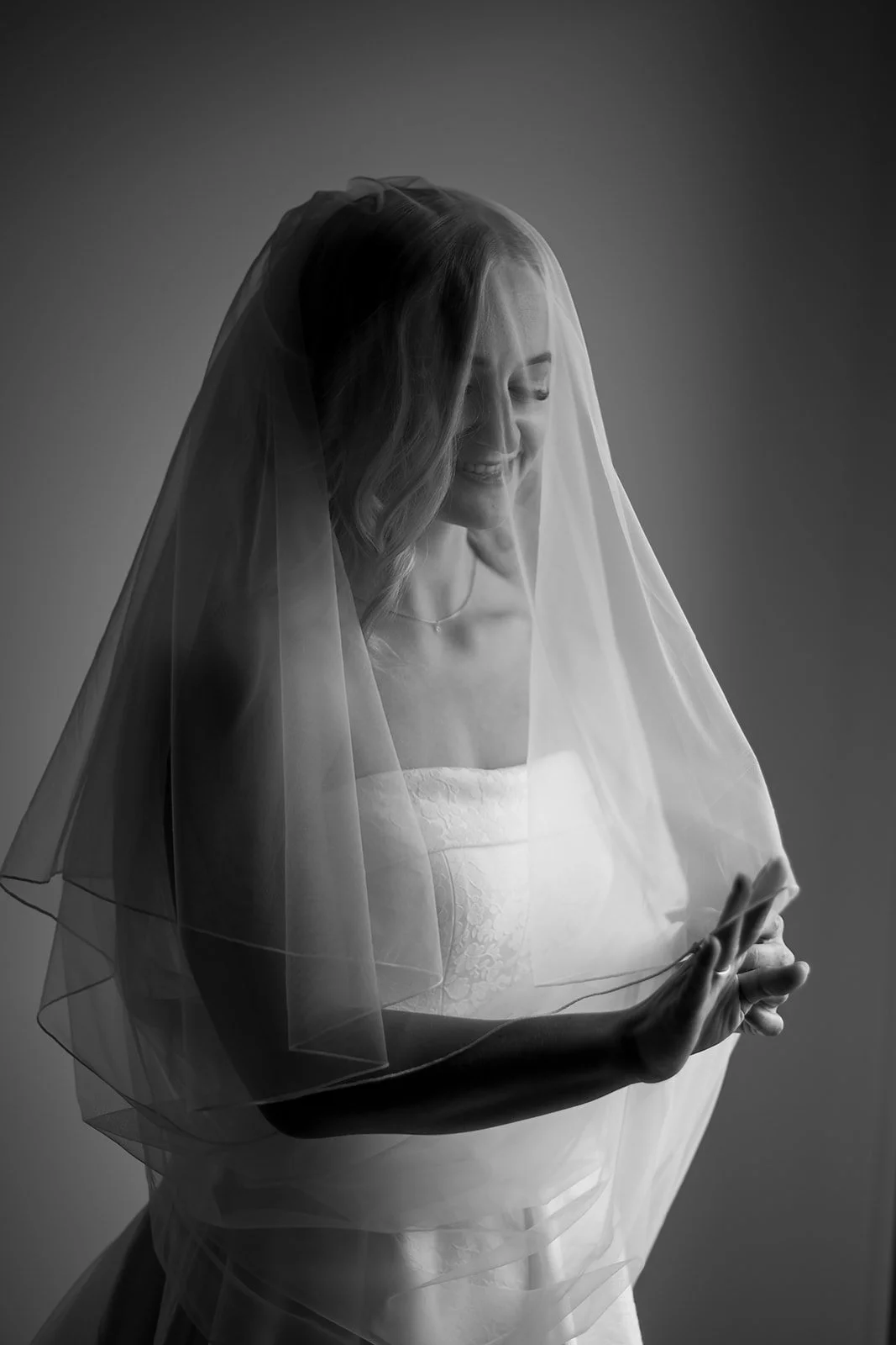 Megan under her veil, in black and white
