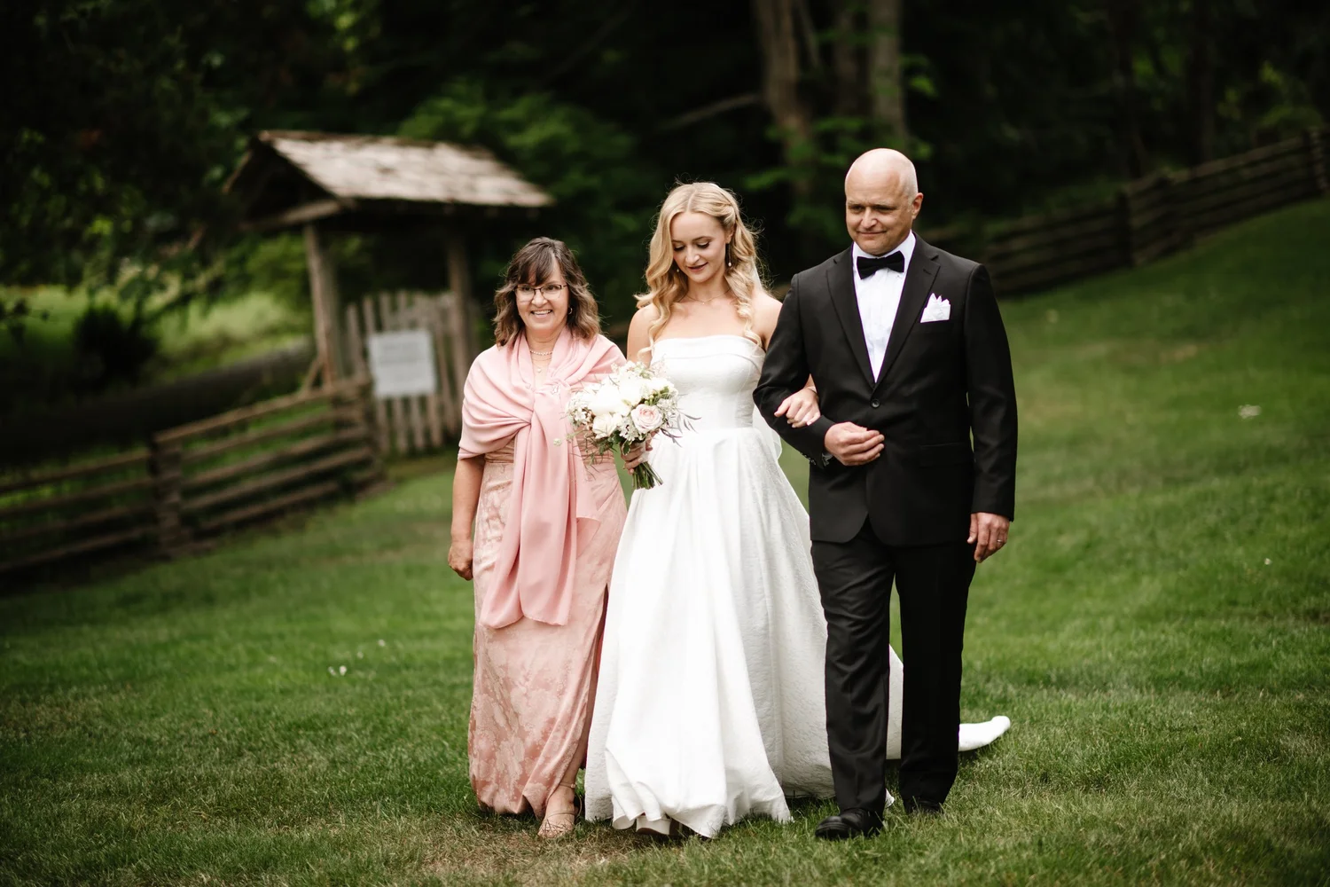 Megan walking with her mom and dad