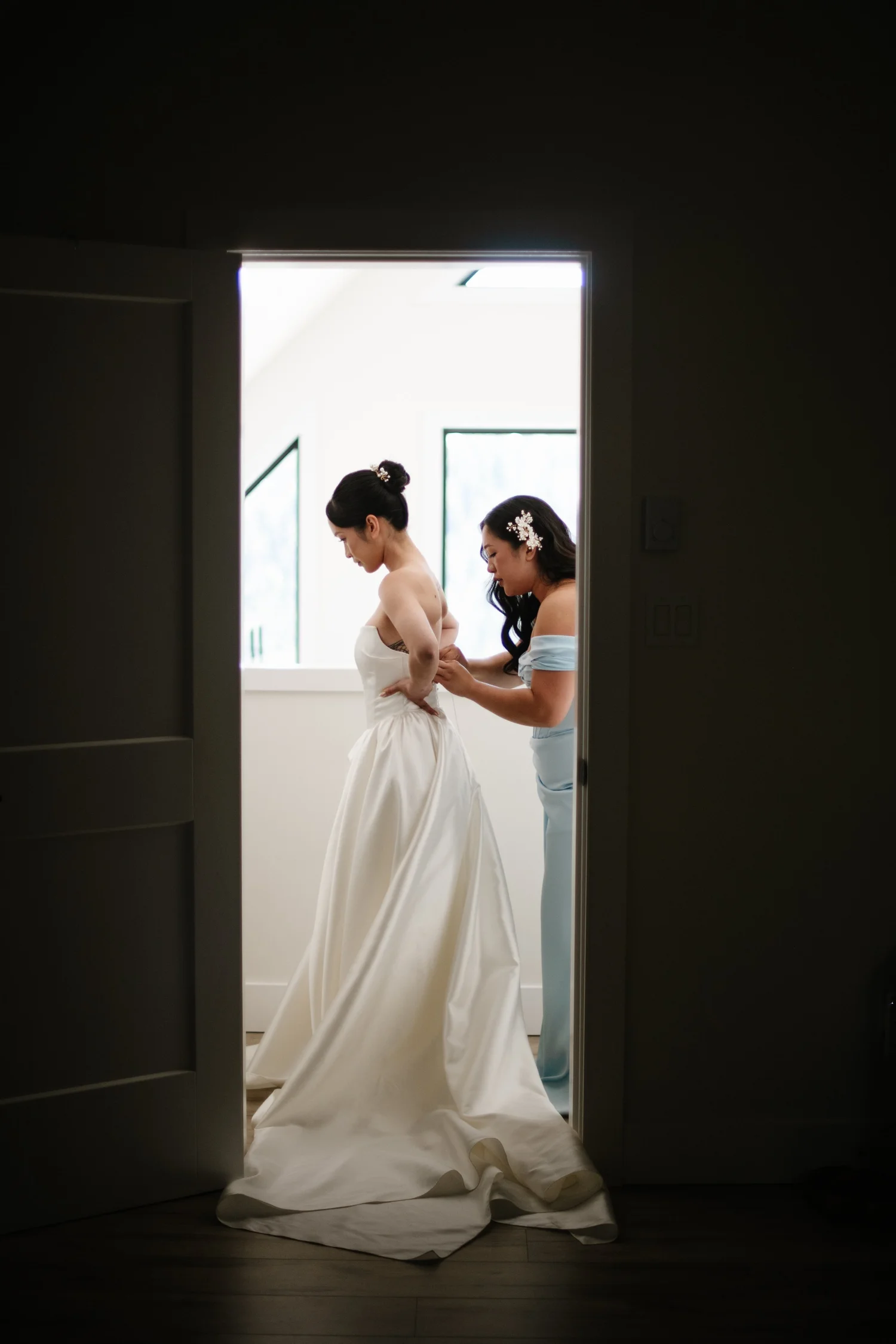 Rea in an open doorway