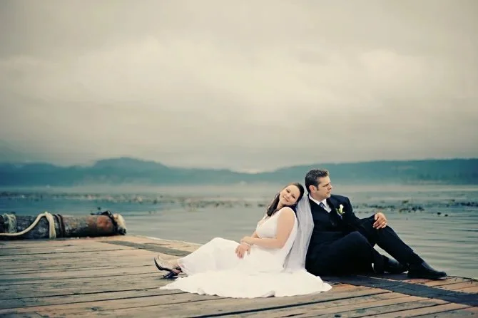 Wedding couple on the dock at Dolphins Resort, Campbell River