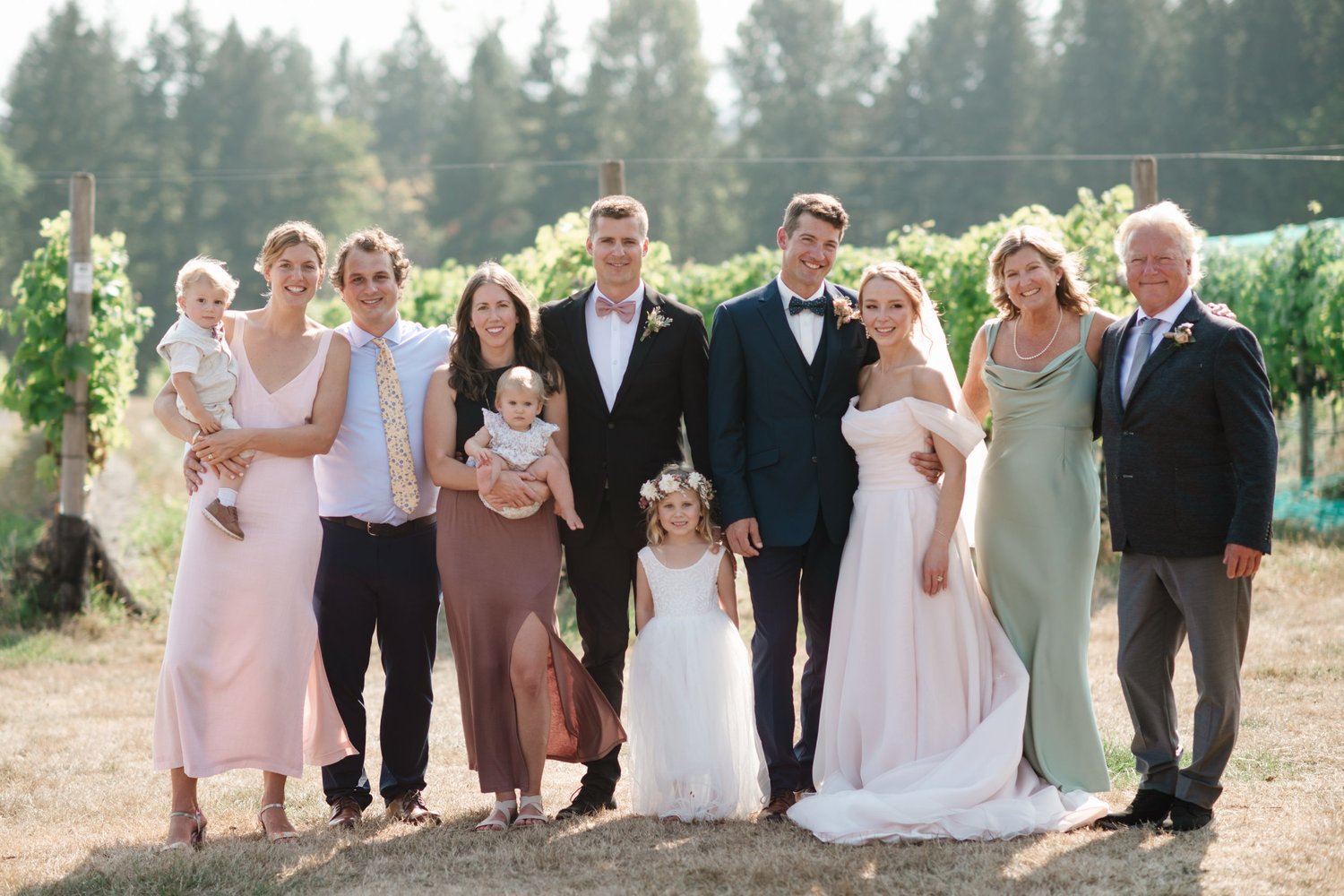 Charlie and Myles with their family in the vineyard