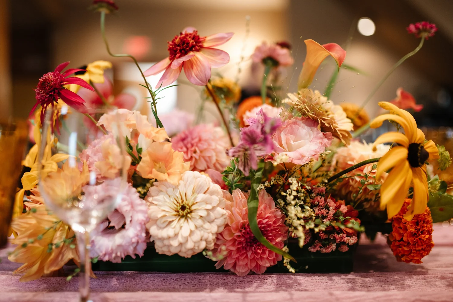 Bright flowers on the long tables