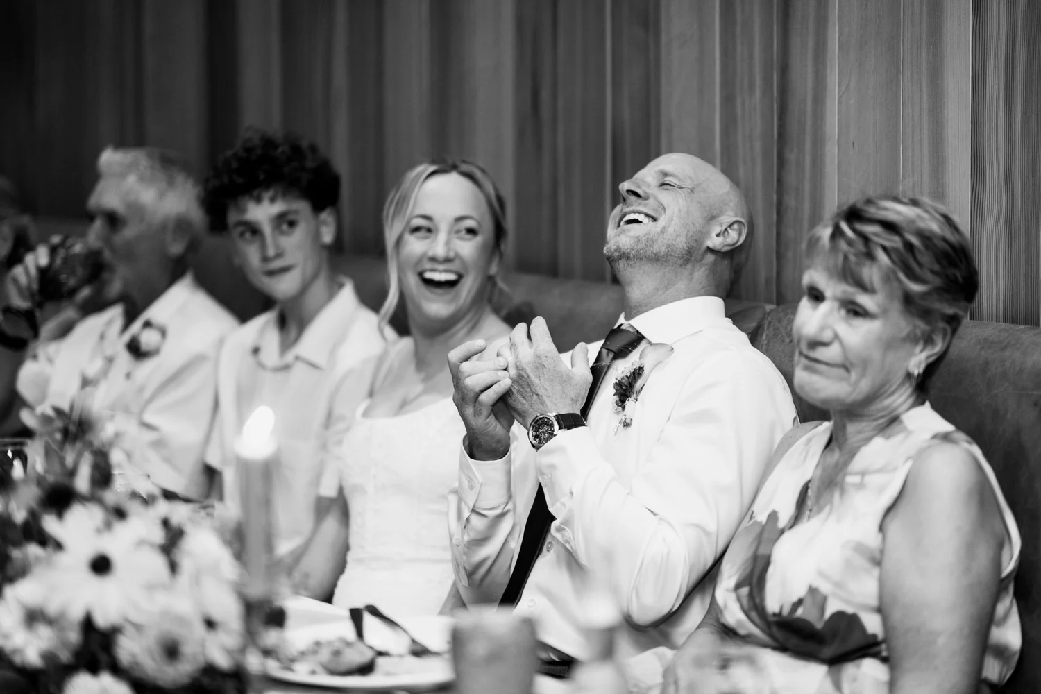 Laughter during the speeches, in black and white