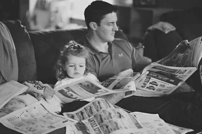 Maisie Daddy reading the paper