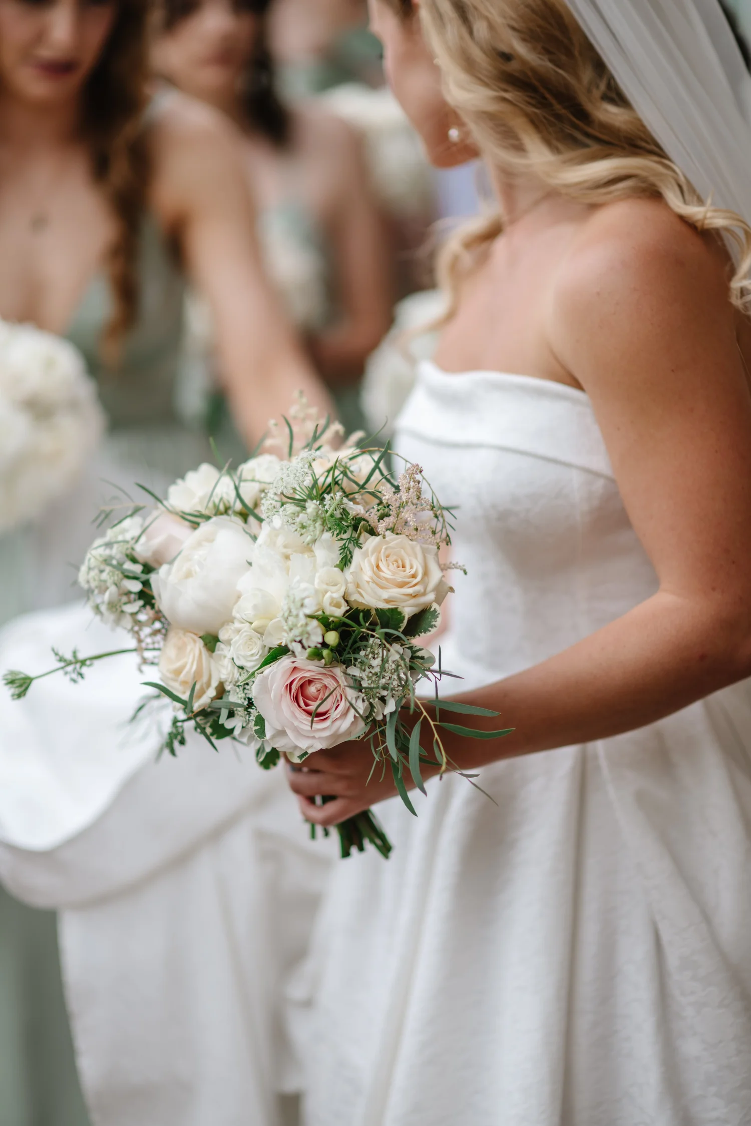 Megan holding her bouquet