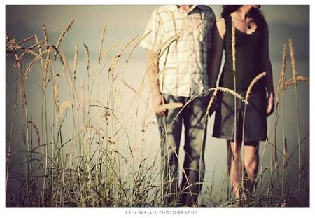 against the grass