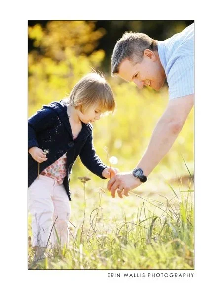 little girl and dad looking at flower madeline and dad looking for flowers