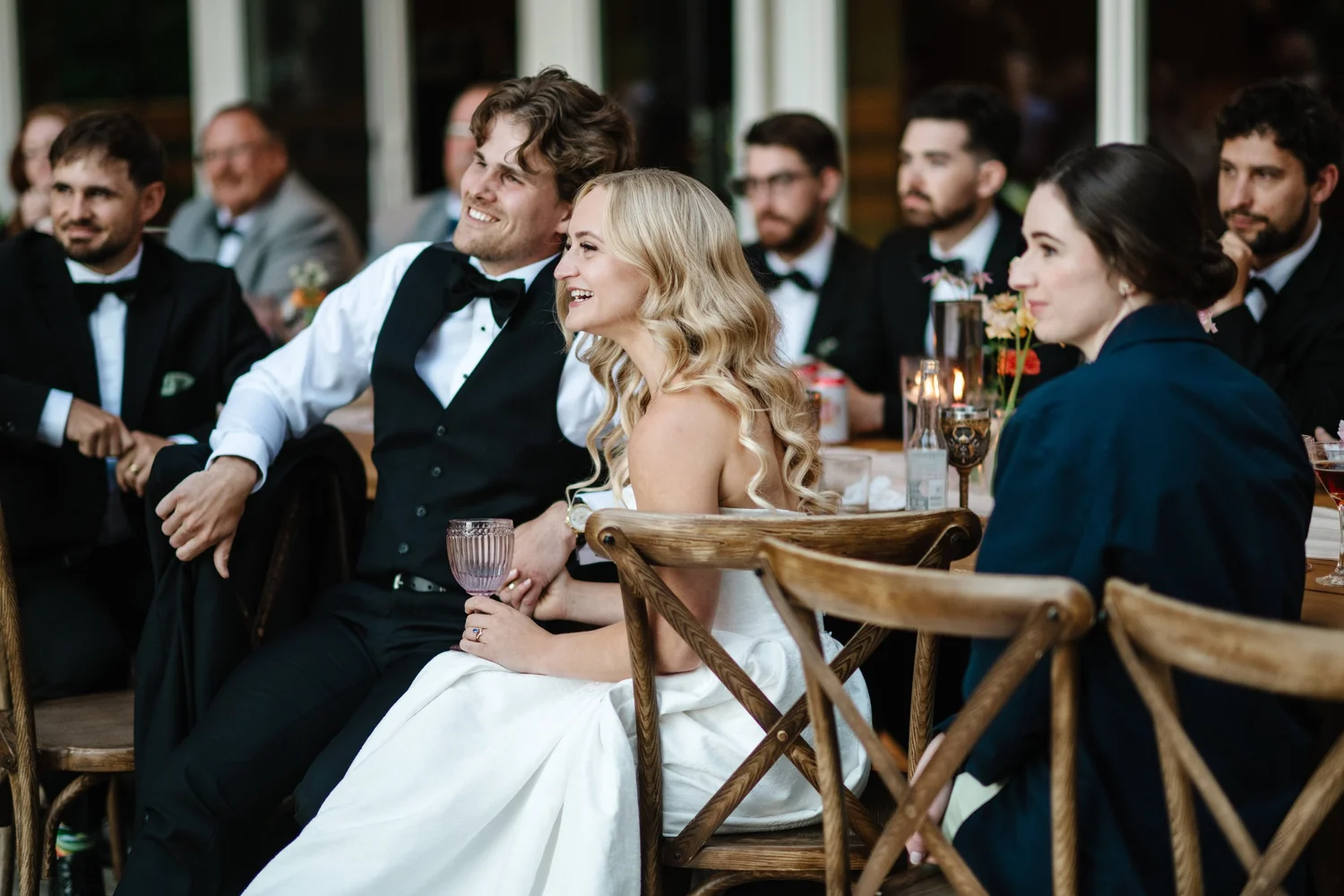 Megan and Devon at the table with guests