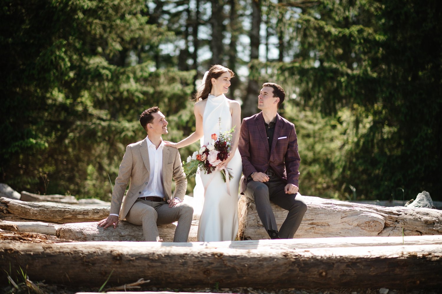 Dana and Cole among the trees with their people