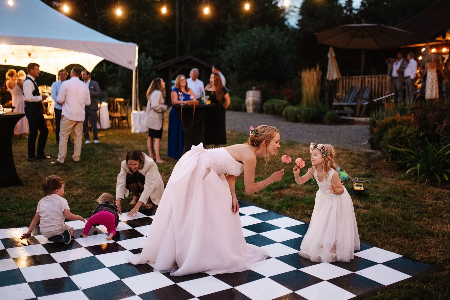 The checkered dance floor full of their people