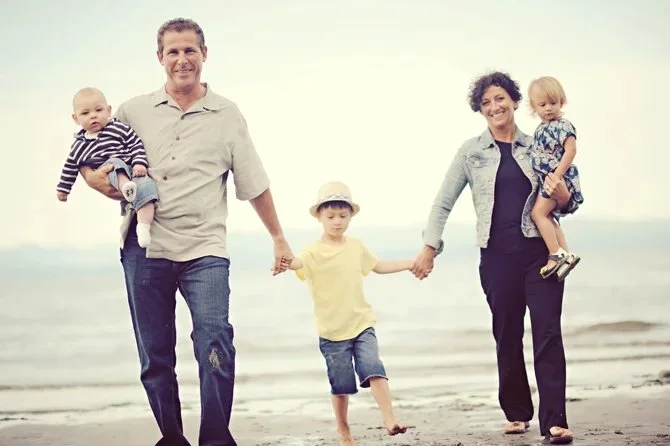 outdoor family photo of grandparents with kids
