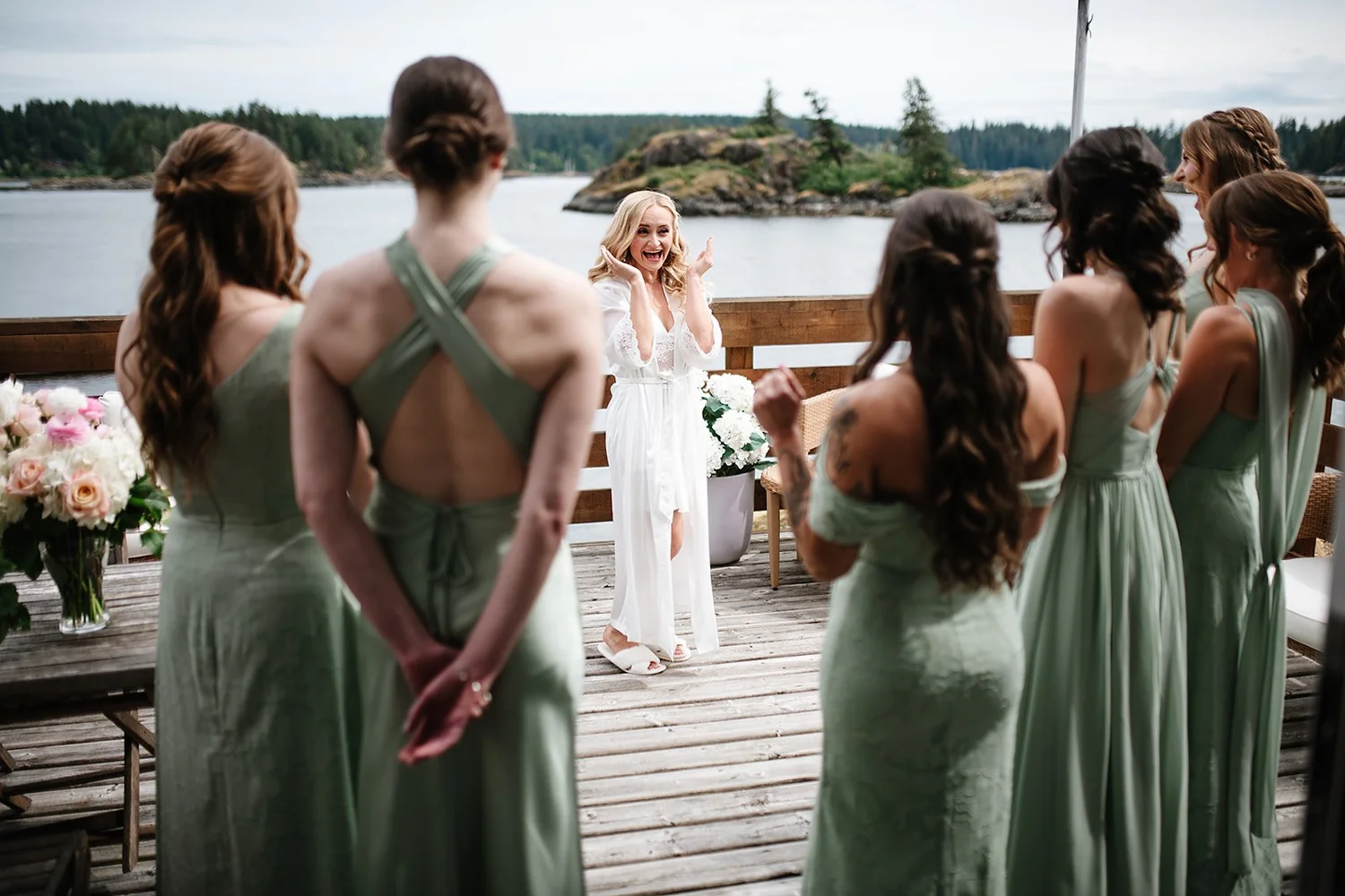 Megan surprising her bridesmaids on the deck
