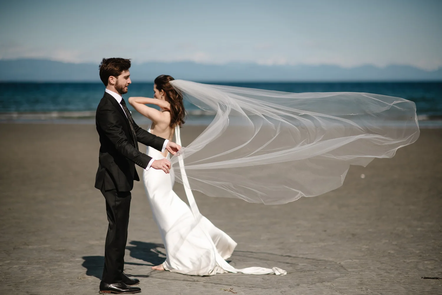 Dana’s veil catching the wind on the beach