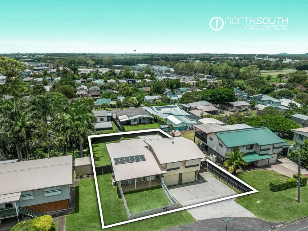 Aerial view of a residential property in Brisbane sold above market and purchased below market in the same week