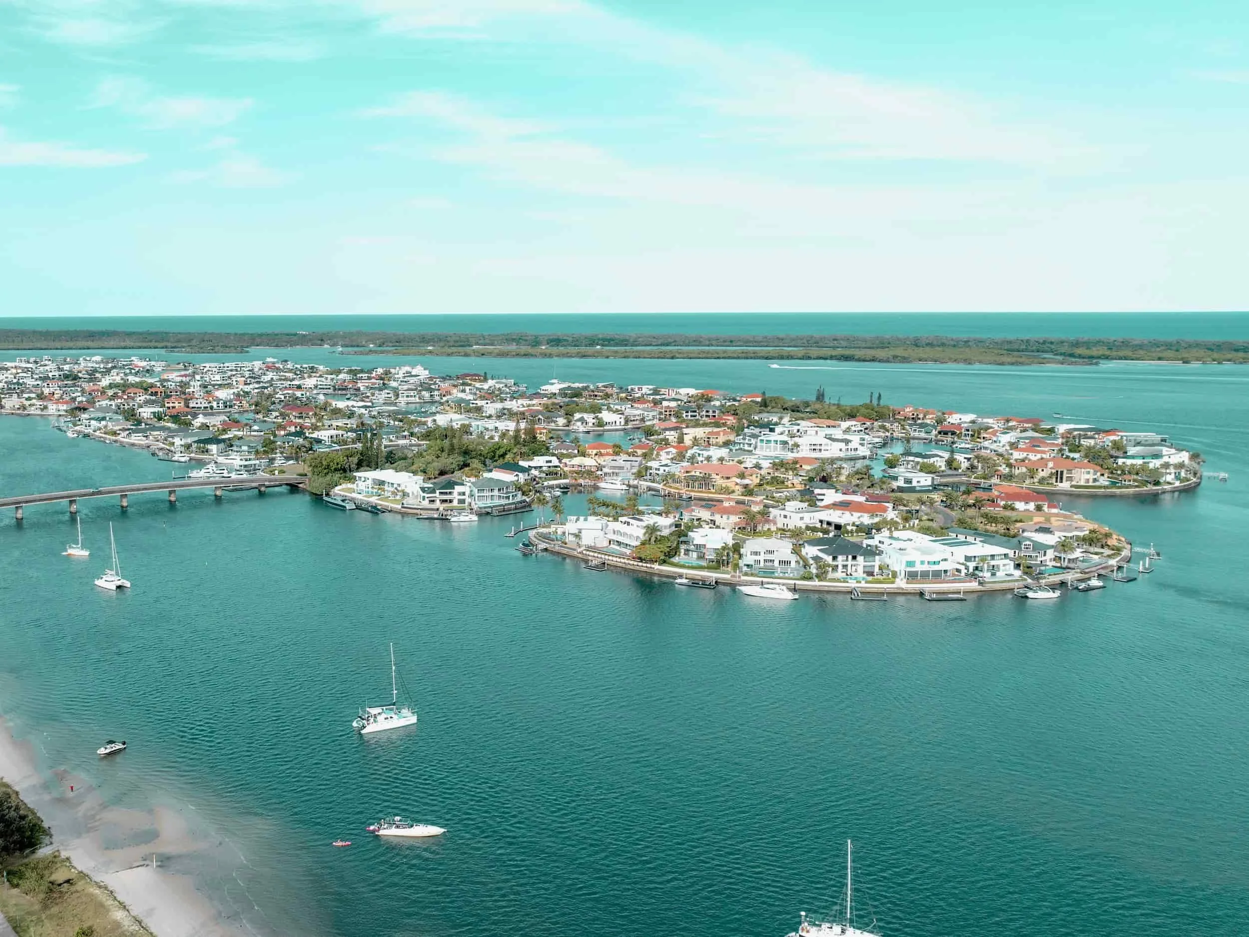 Waterfront mansions with private berths on the canals at Sovereign Islands, Gold Coast