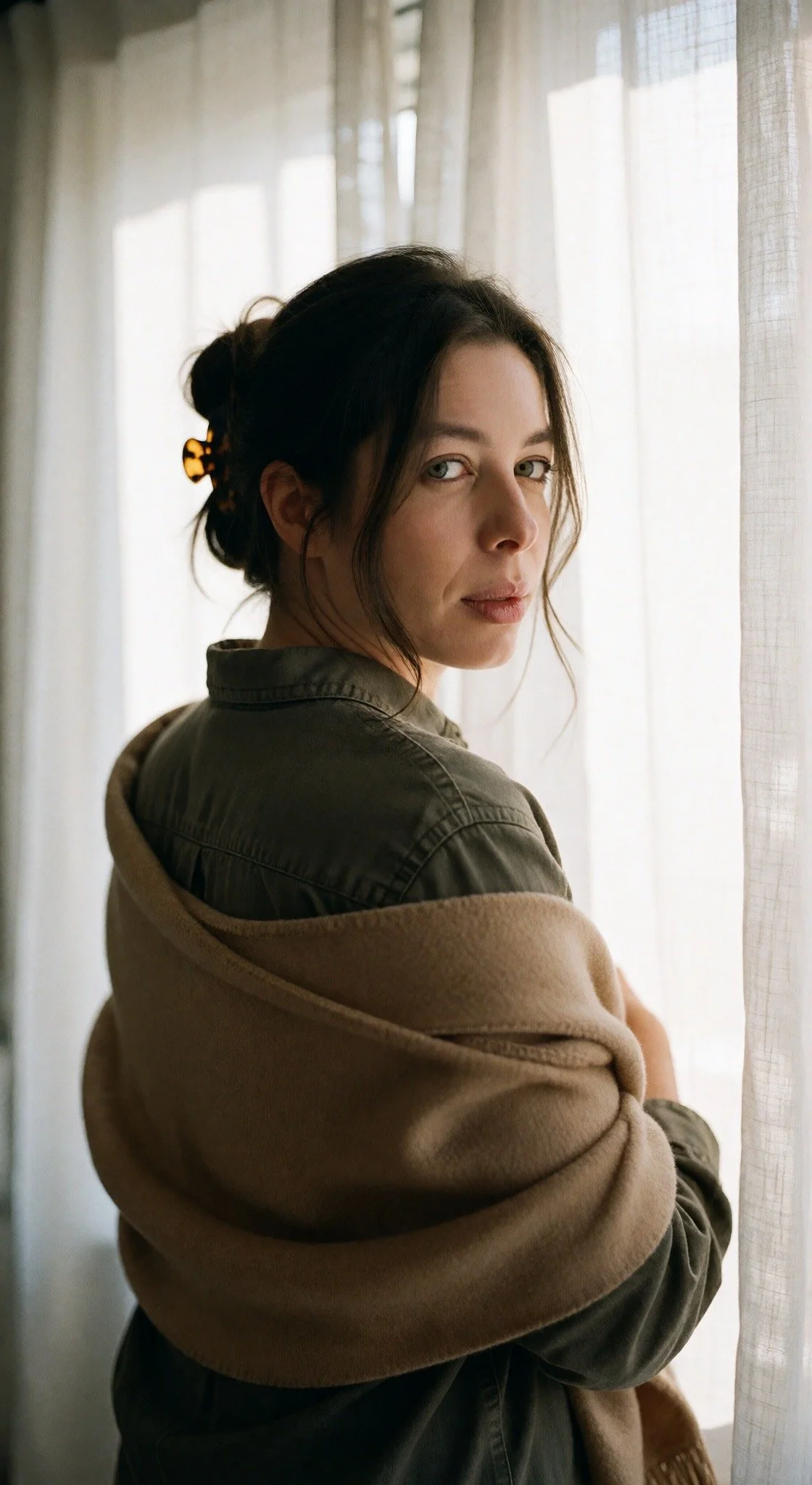 Portrait by a sunlit window