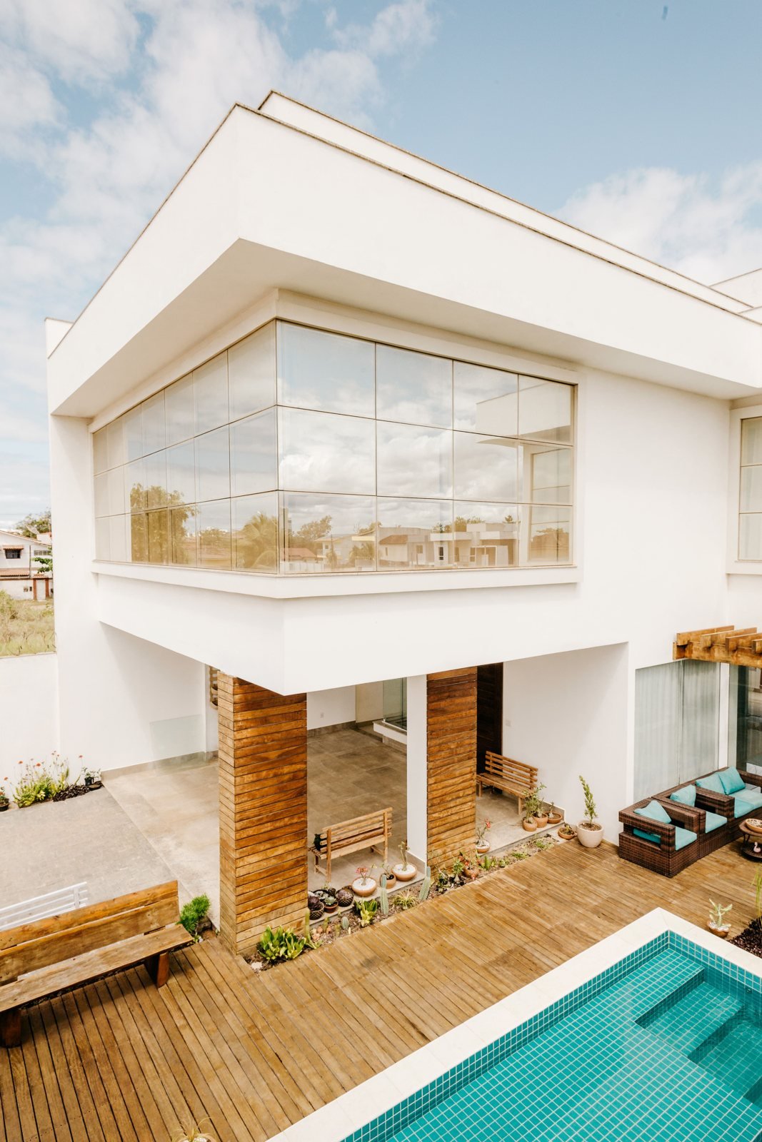 Contemporary house with a glass facade and swimming pool