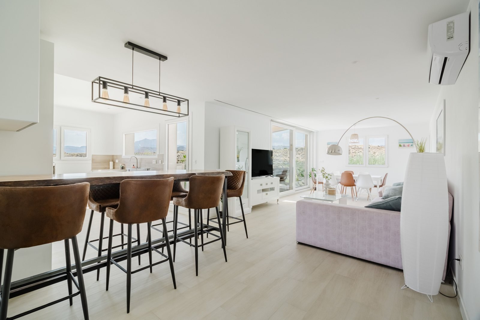 Bright open living area with contemporary furnishings