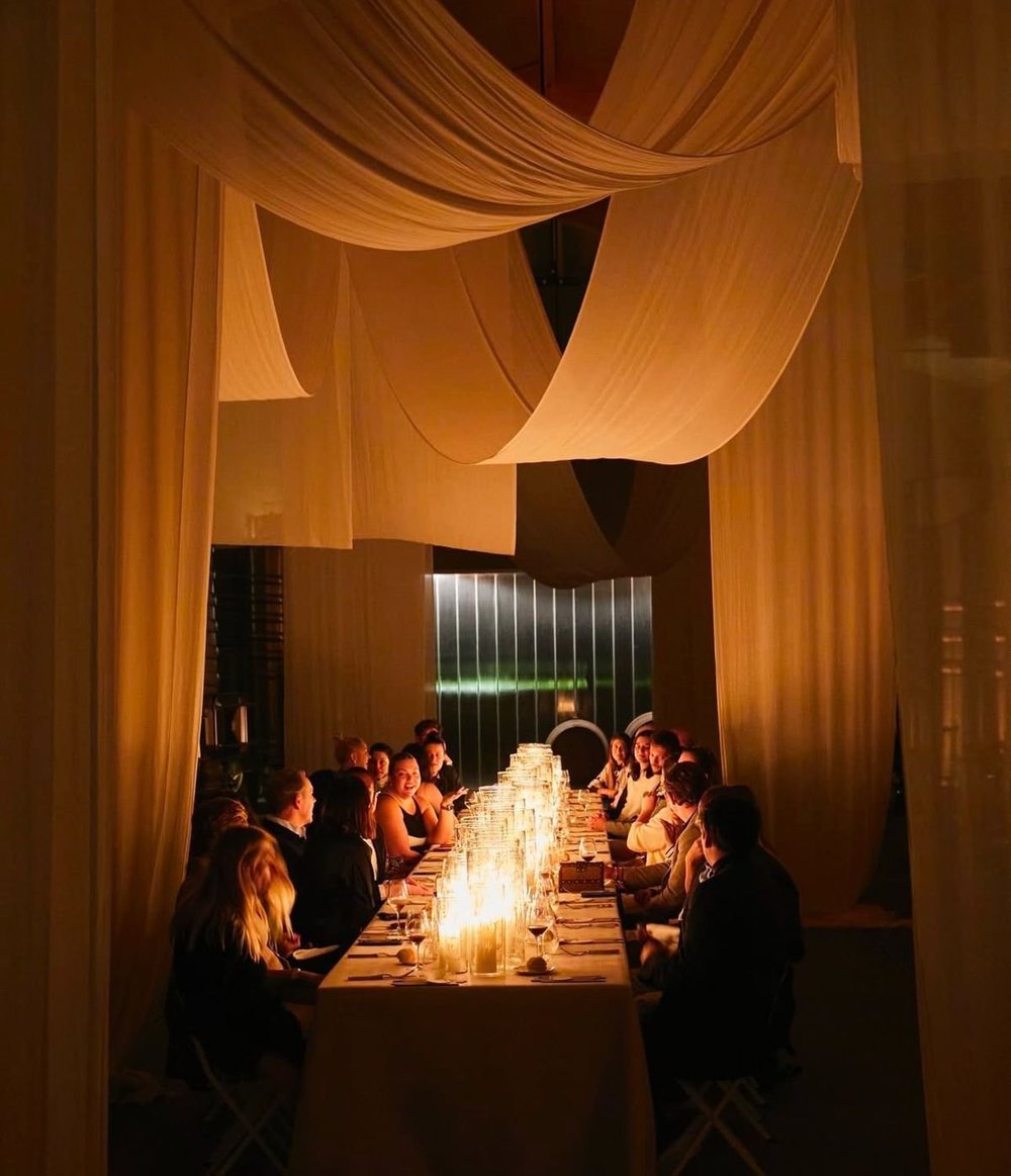 An intimate dinner under soft drapes