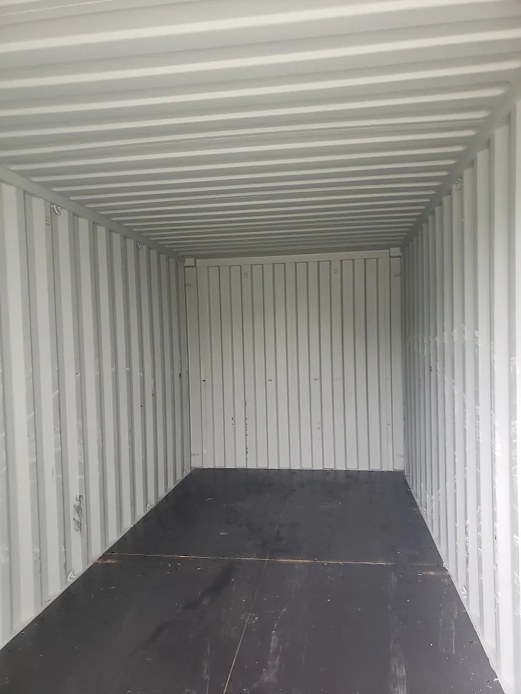 Two white containers placed side by side