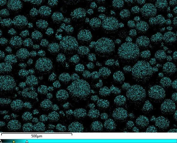 element map of the same particle showing a continuous metal nano-coating over its whole surface.