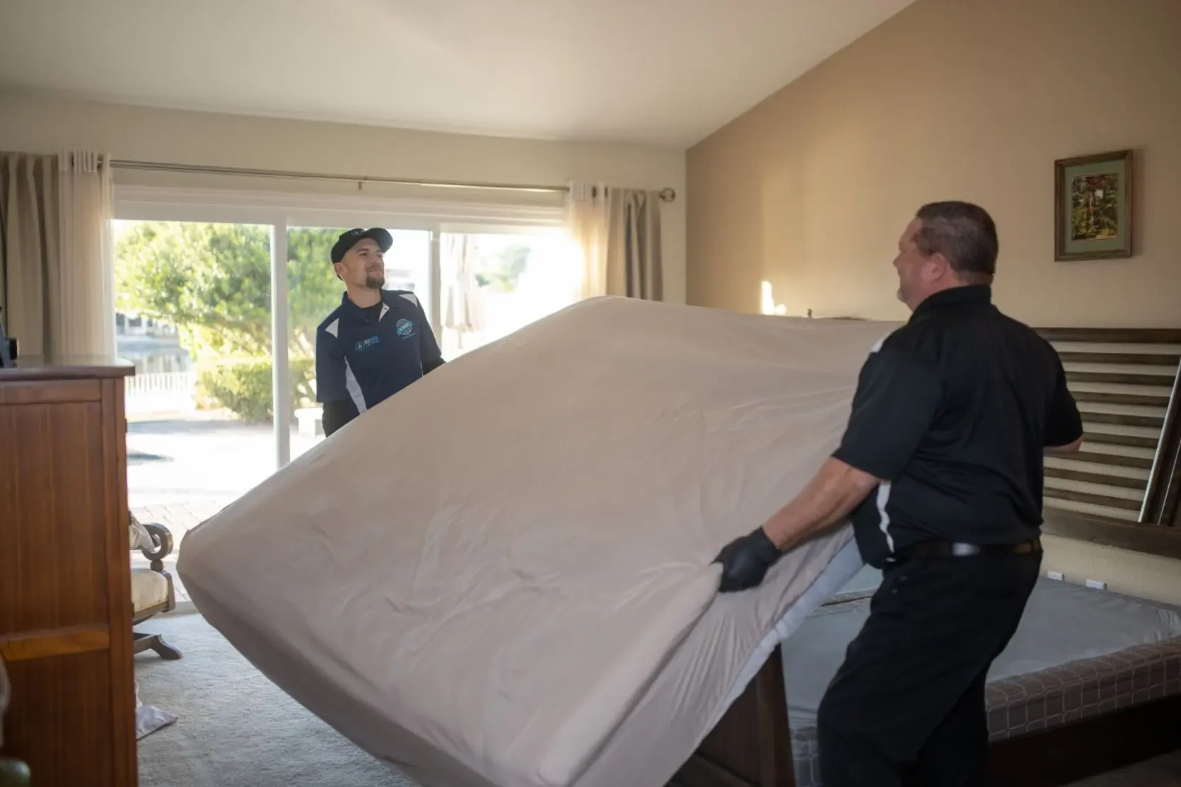 Bed Bugs Arizona treating a bed frame by hand, How to Prepare for Bed Bug Treatment in Phoenix, AZ