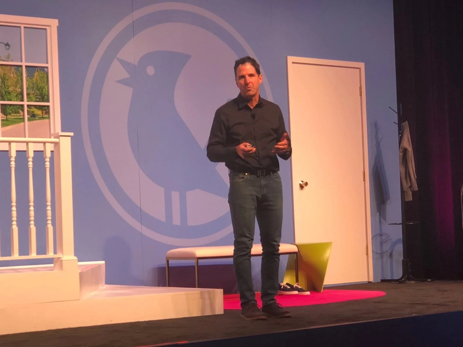 Carlos Hidalgo speaking on stage