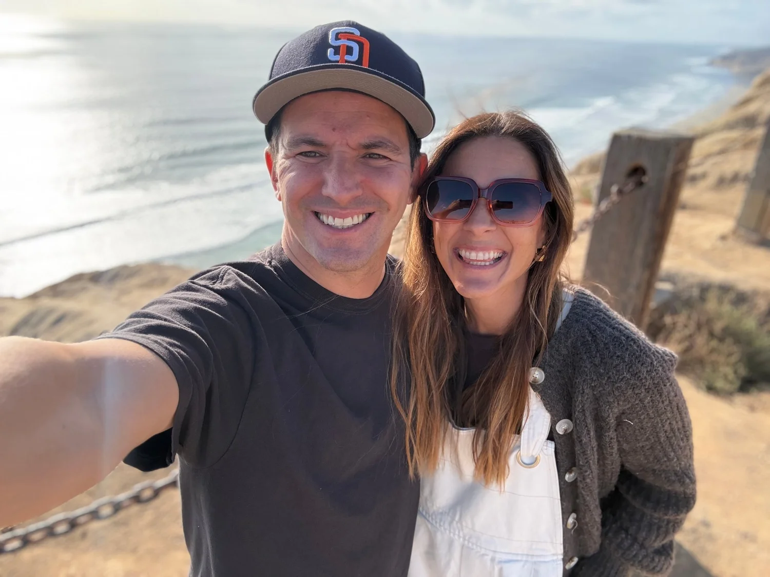 Josh Martin and his wife on the cliffs above the Pacific in San Diego