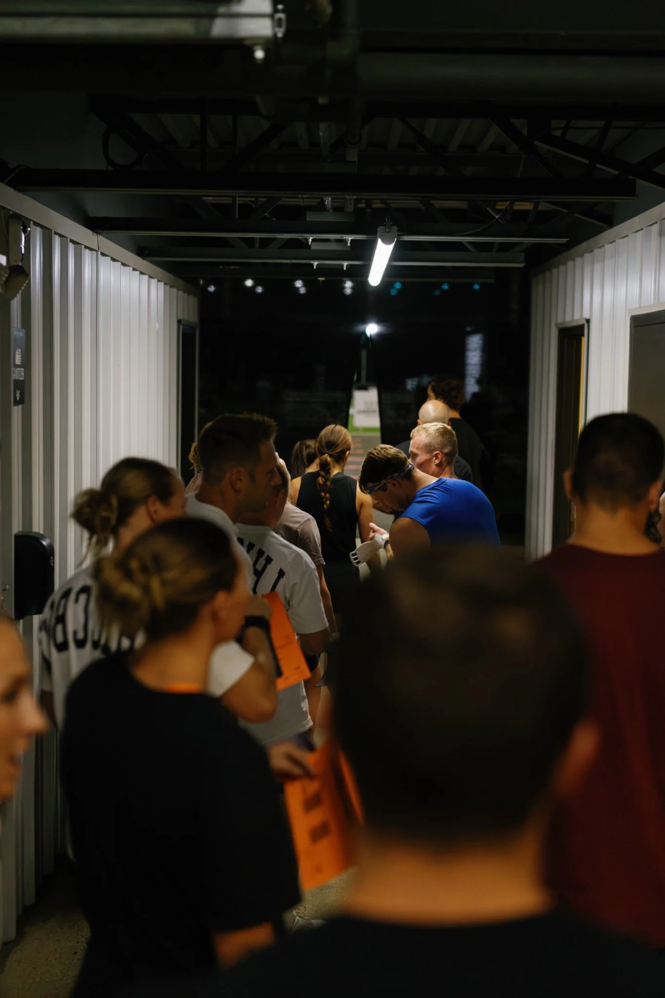 Athletes gathered inside a training facility