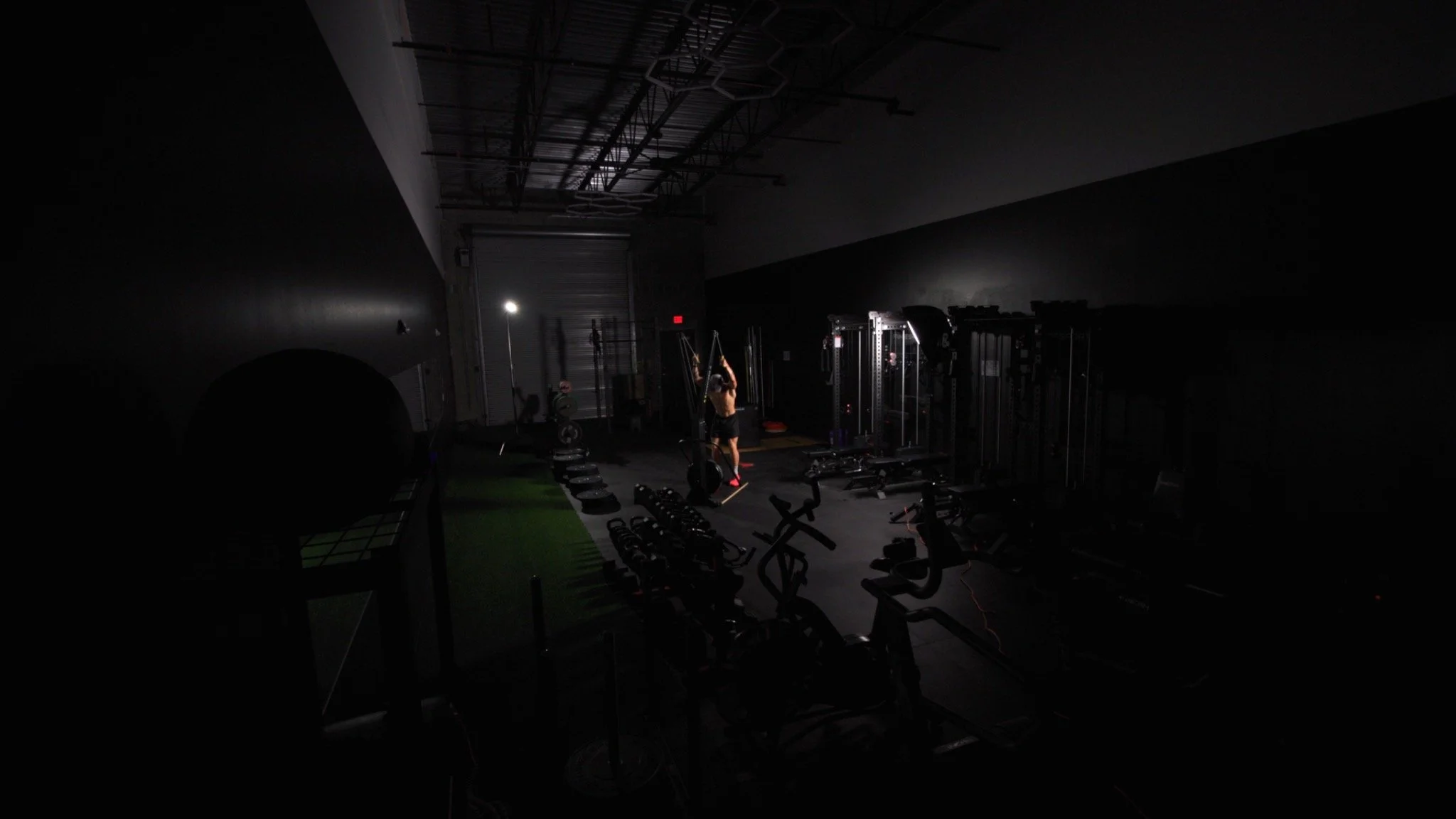 Wide view of a gym during a cinematic athlete training shoot