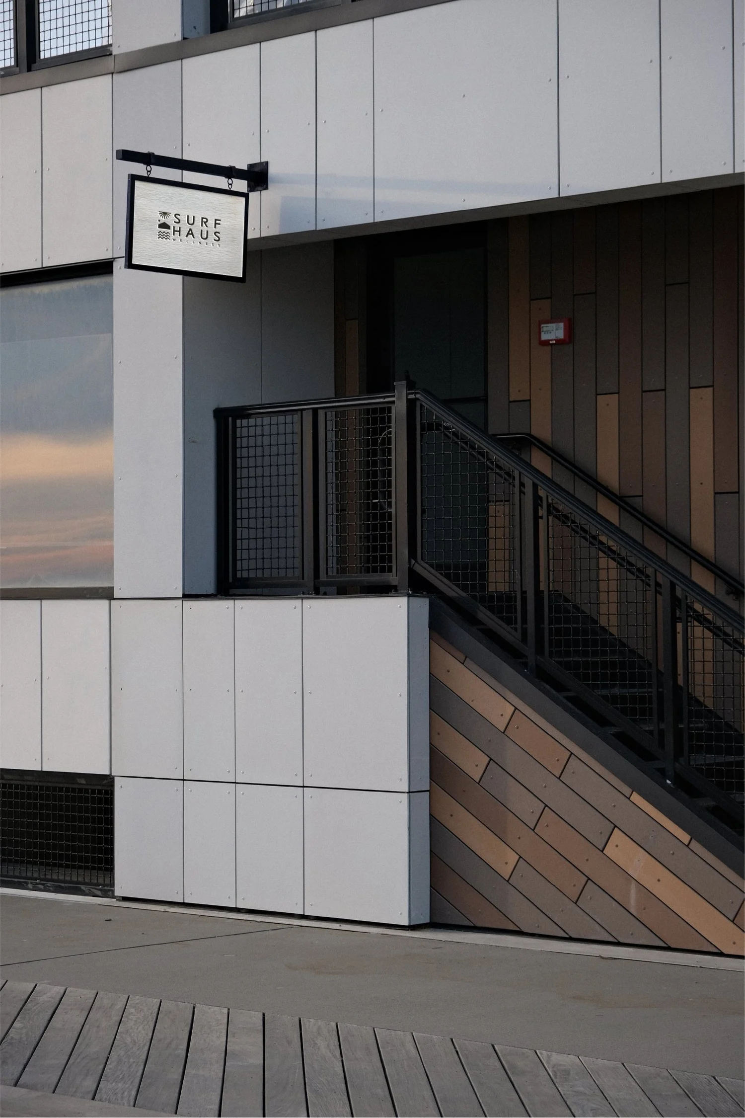 Surf Haus Wellness blade sign, designed by Carolina Marques