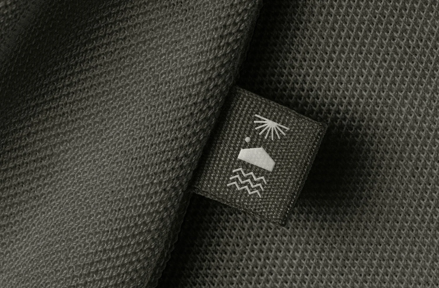 Surf Haus Wellness woven label, designed by Carolina Marques