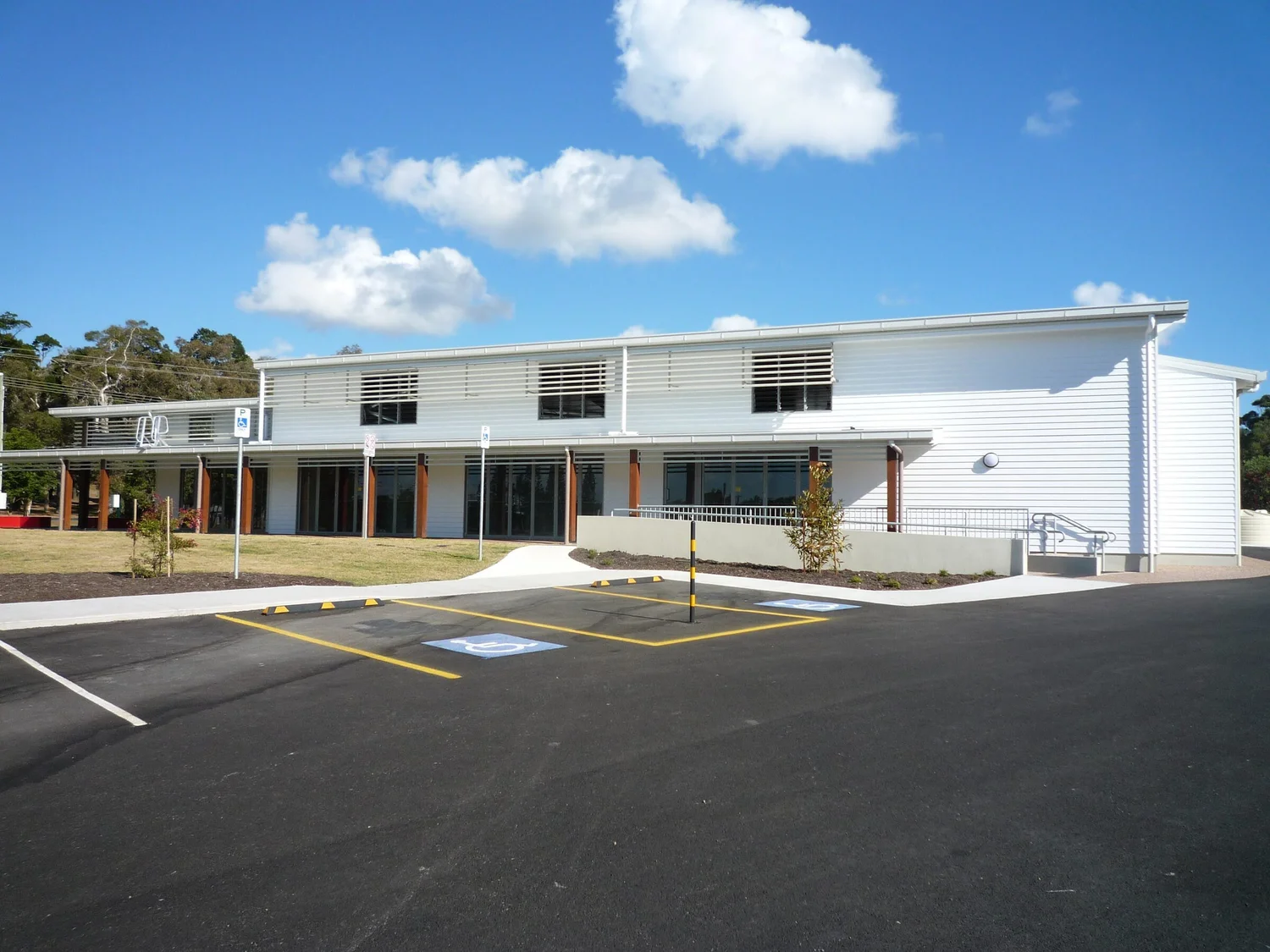 The hall from the car park, with accessible parking bays close to the entry