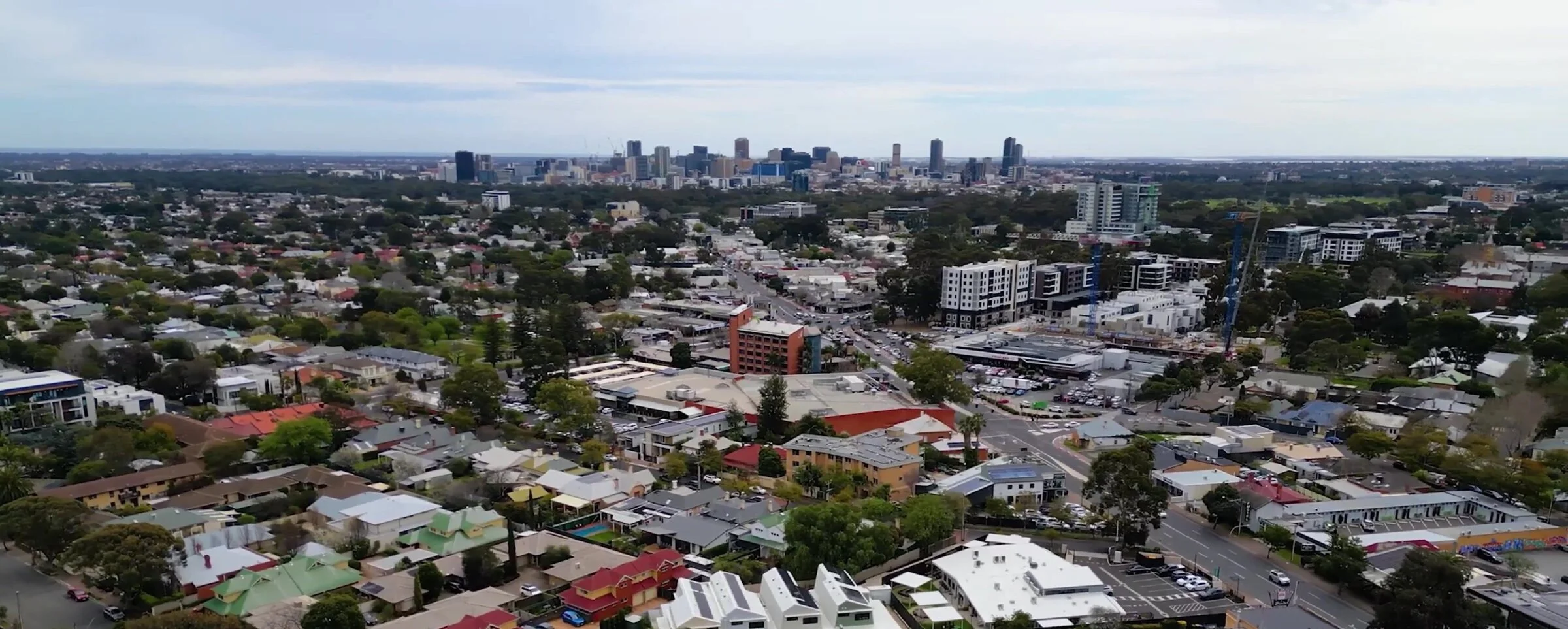 Aerial view across Fullarton to the Adelaide city skyline