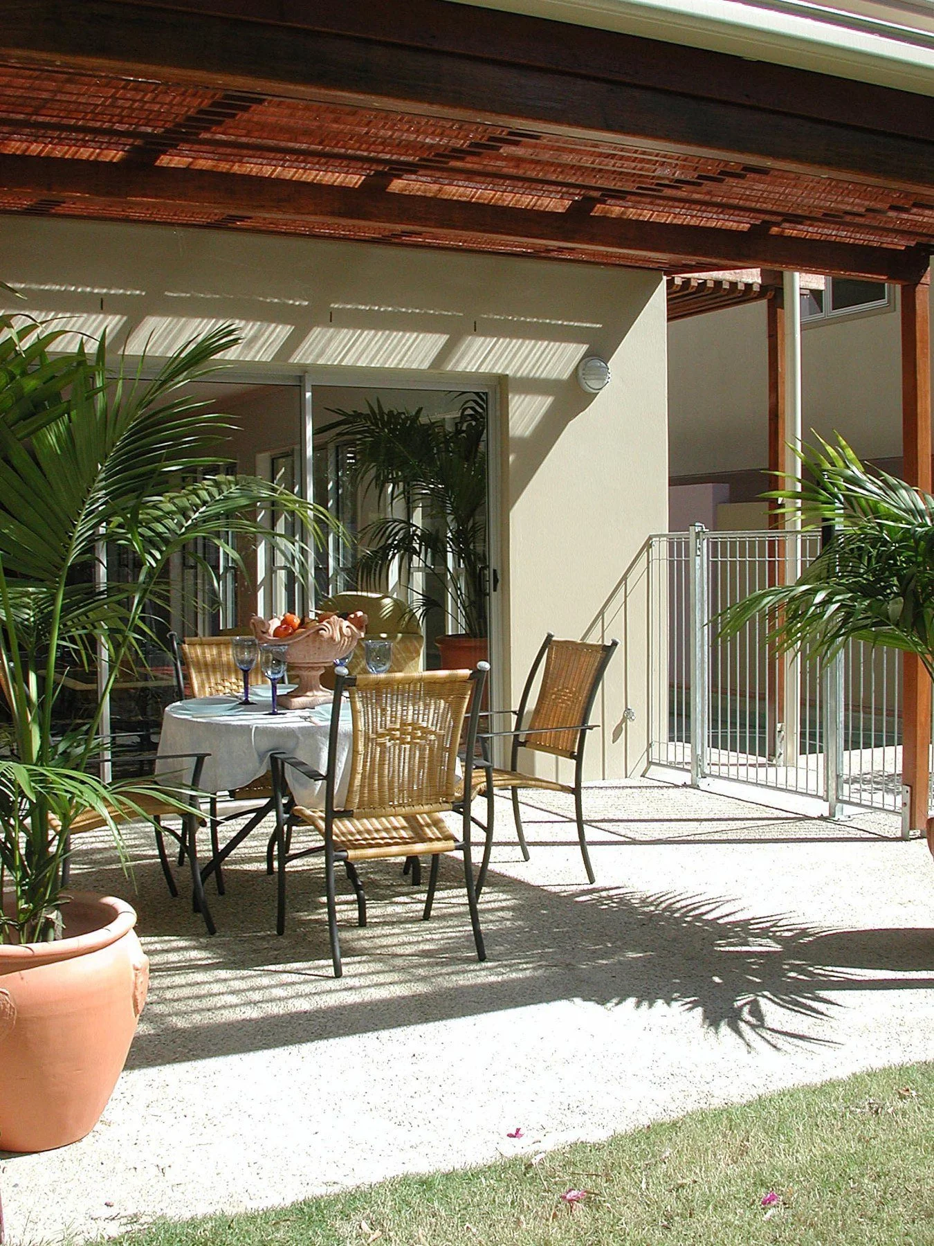 Outdoor dining under a timber pergola
