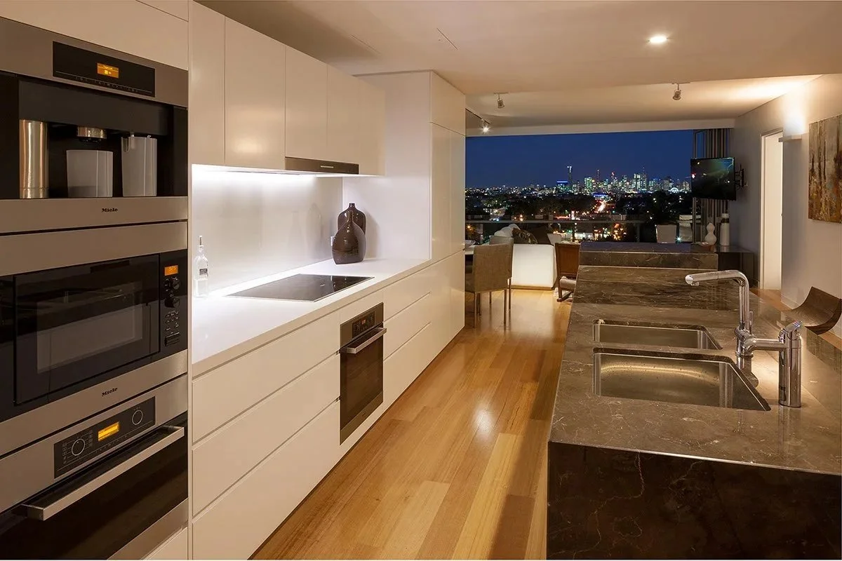 Kitchen with the evening skyline beyond