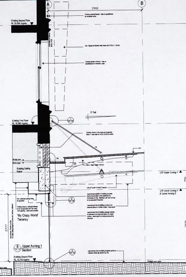 Construction detail section through the facade and awning