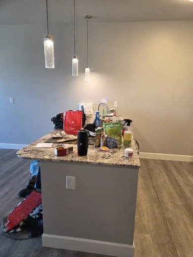 Kitchen and island before cleaning