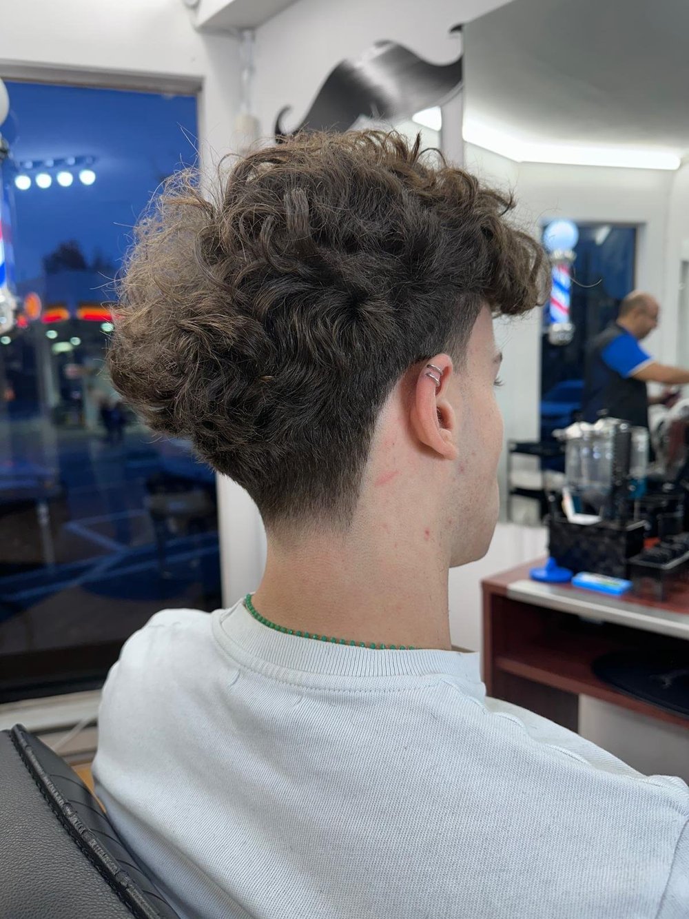 Curly top, tapered back