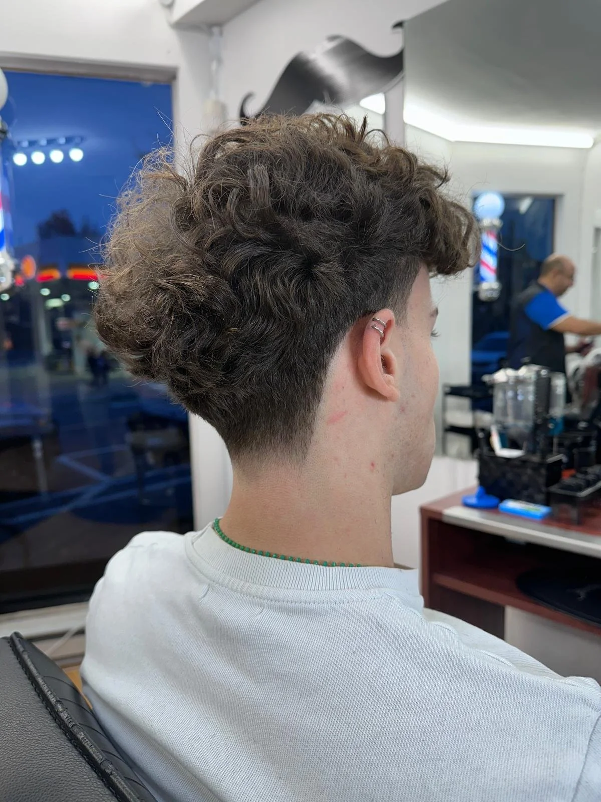 Curly top, tapered back