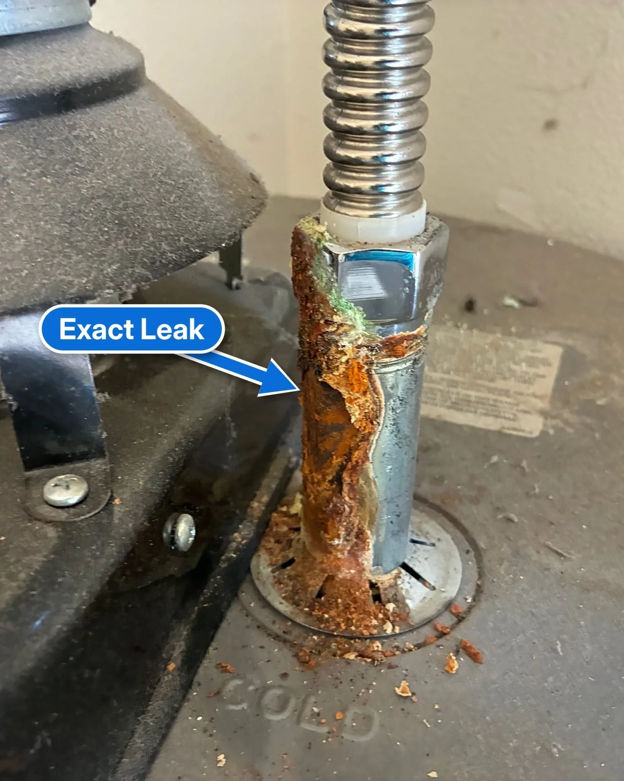Rusted-through cold water nipple on top of a water heater