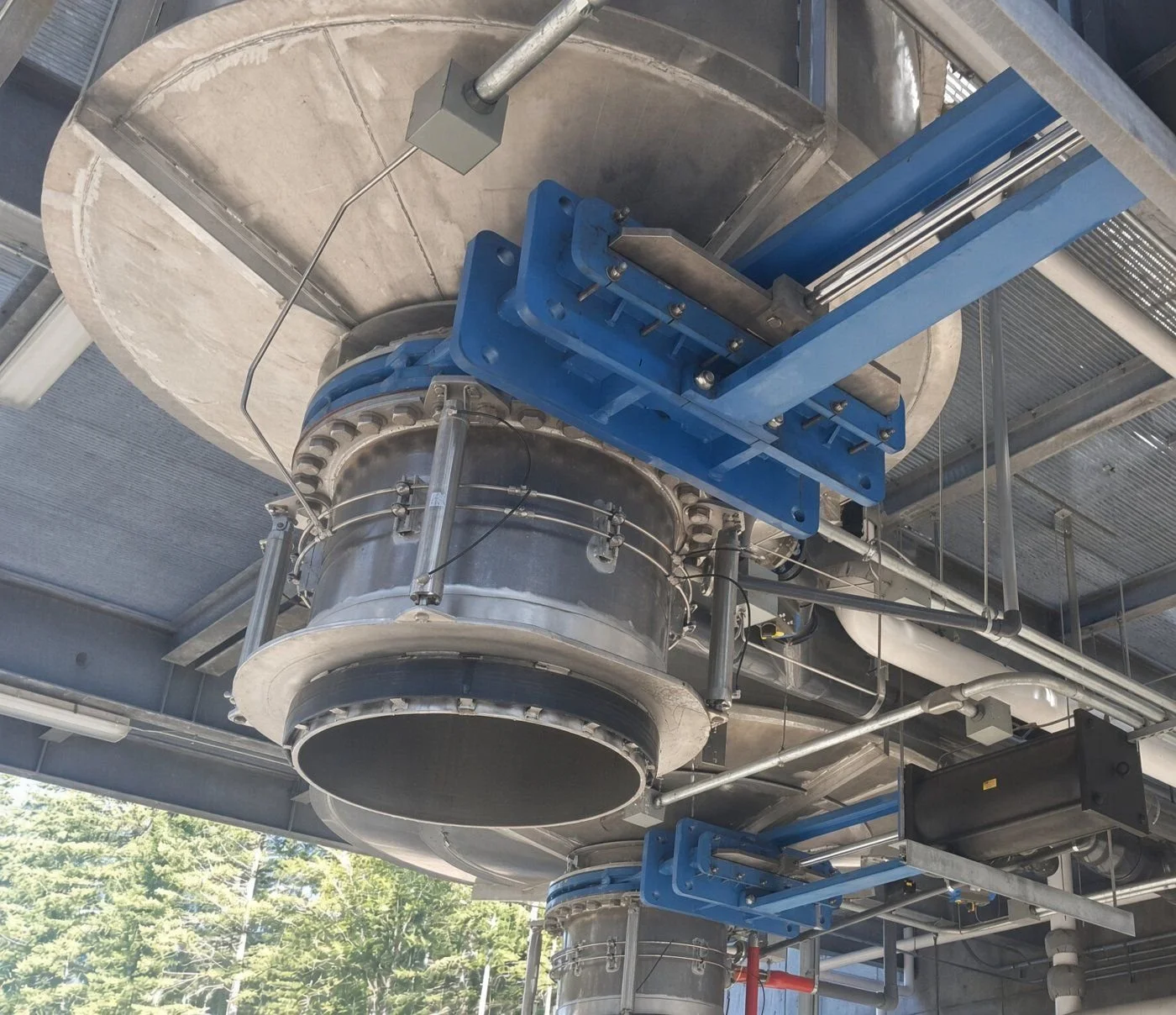 Knife gate valves installed below a hopper with pneumatic cylinders