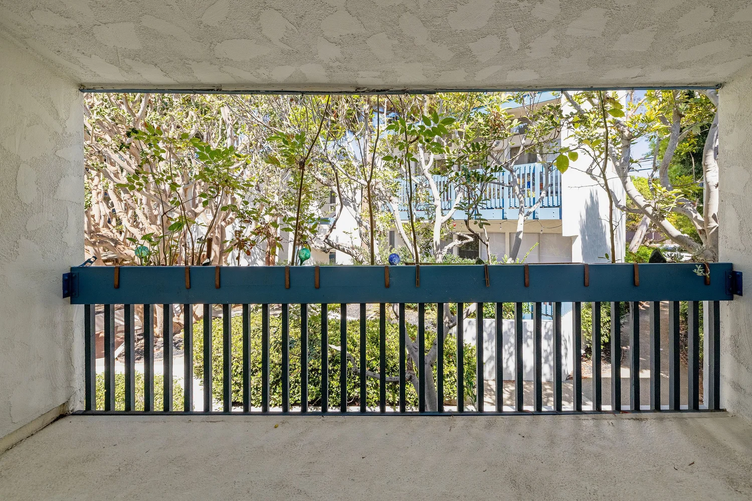 Covered balcony looking out into the trees
