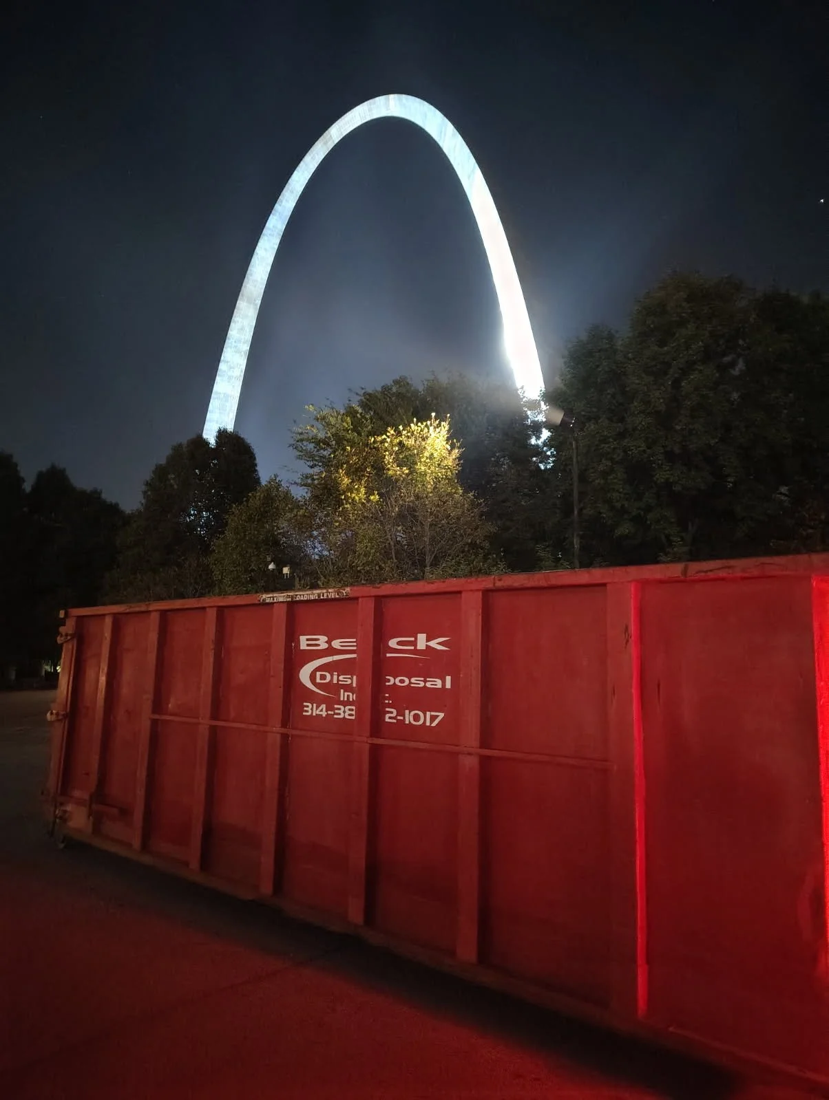 Beck container beneath the illuminated Gateway Arch at night