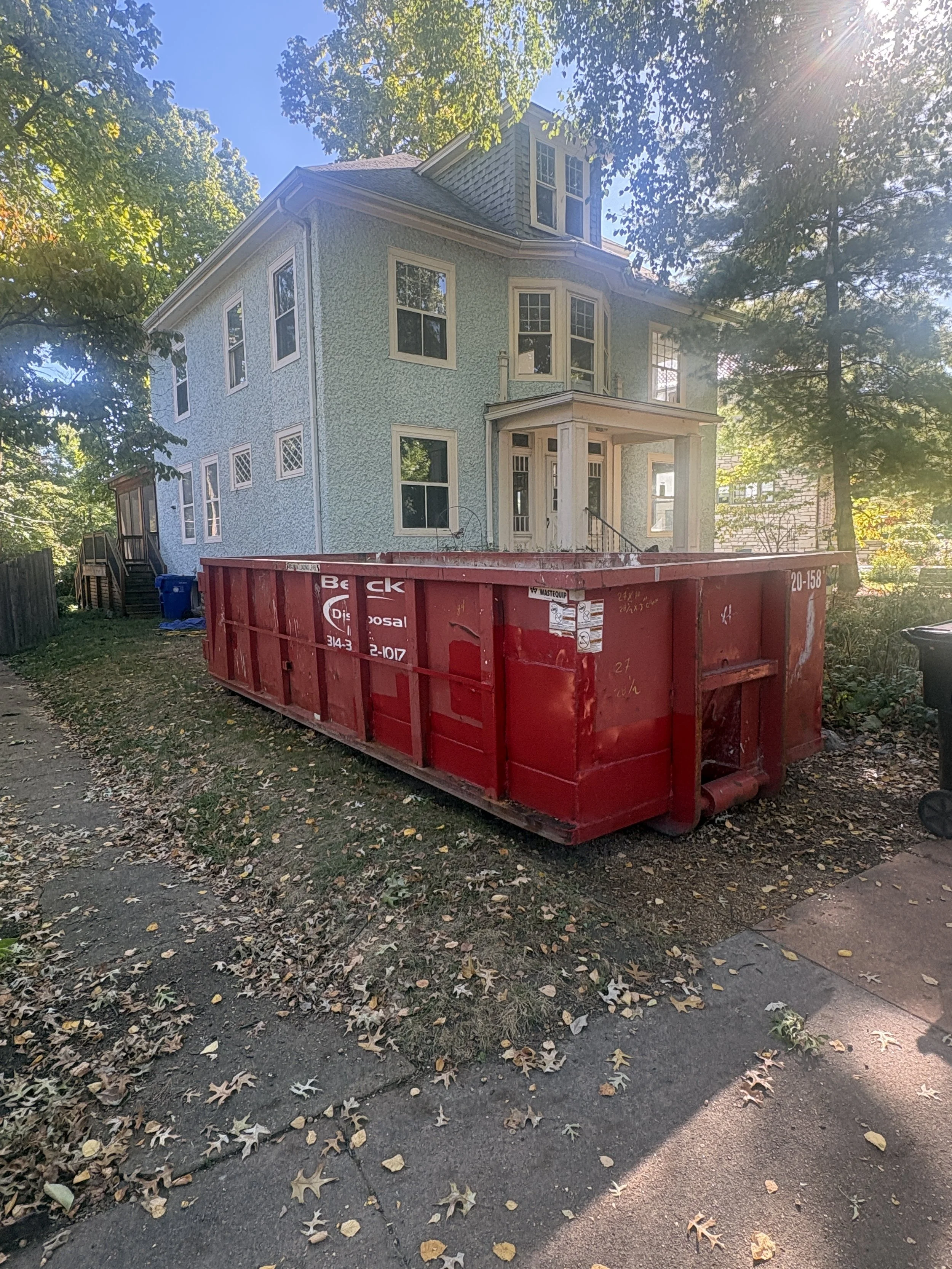 Beck container beside a house during a residential project