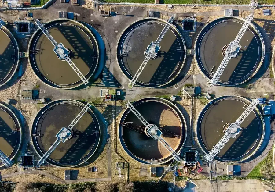 Clarifiers at a sewage treatment plant, seen from above