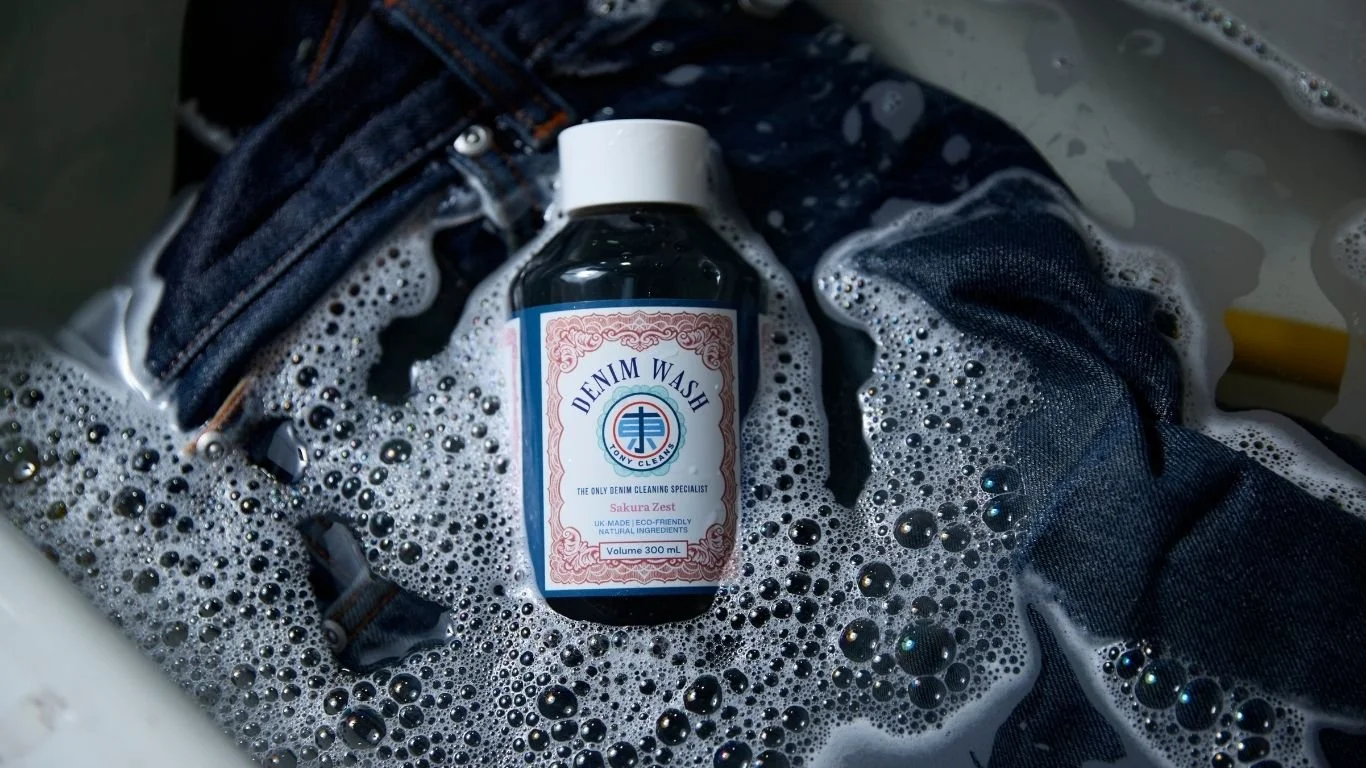 Whole Tony Cleans Denim Wash bottle with jeans in the washing trough