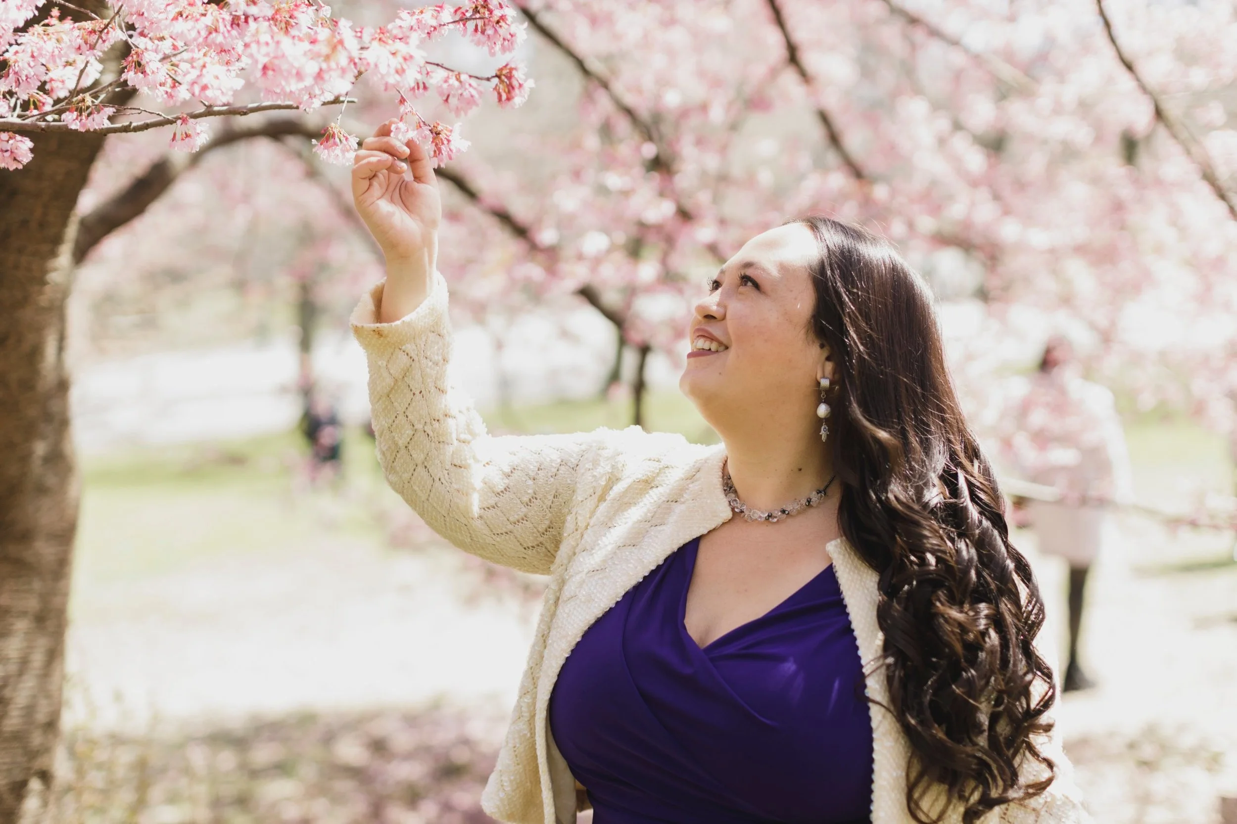 Rachel Haymer among cherry blossoms