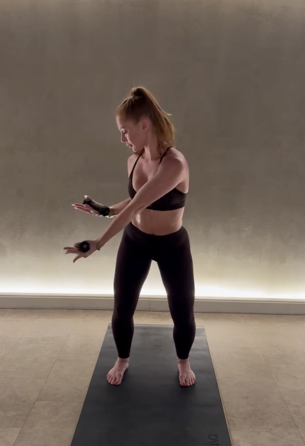 Yavay in an arm sequence with light weights